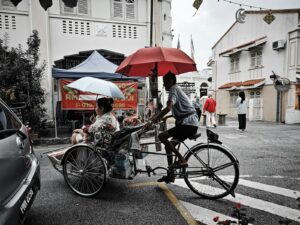 A group of people riding on the back of a bike
